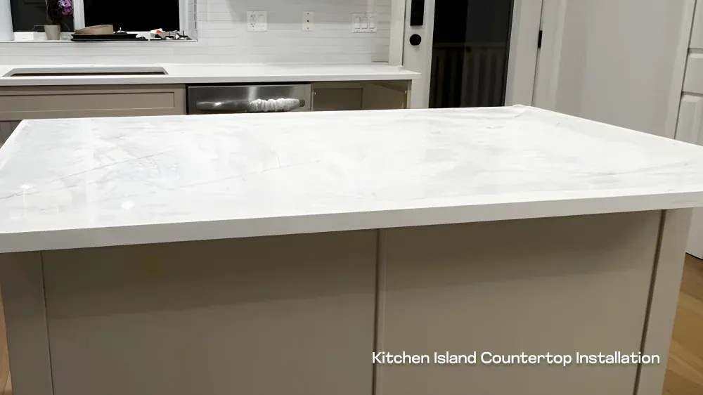 In-progress installation of soft-close drawer tracks and cabinet hardware inside a custom kitchen island.